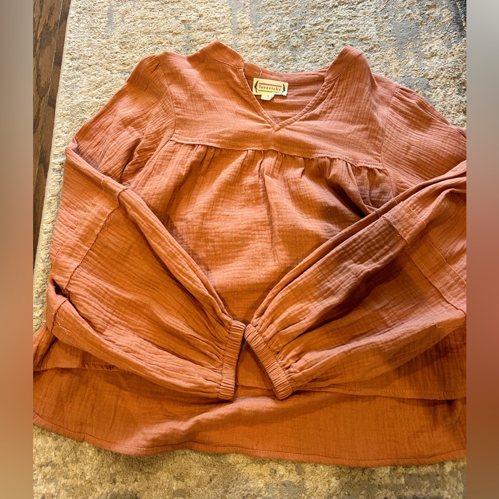 Boutique brand, light pink blouse.